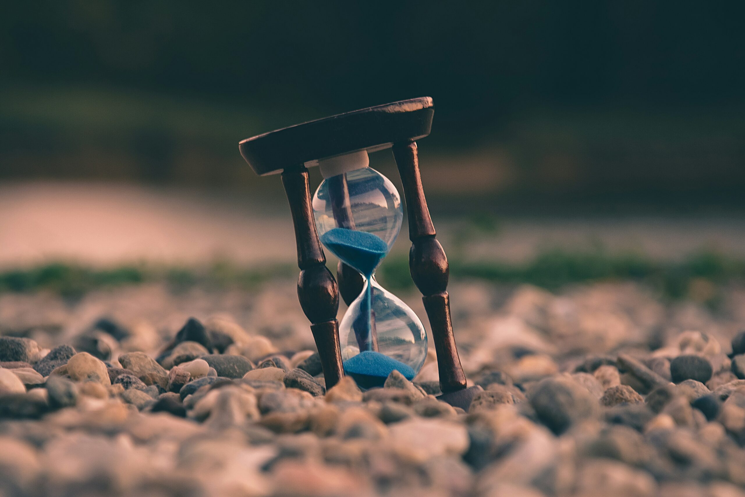 Hour glass timer on beach